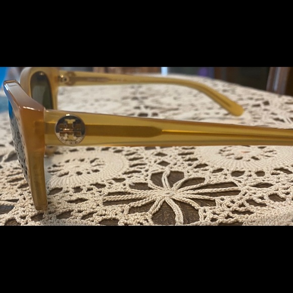 Authentic Tori Burch sunglasses with case.